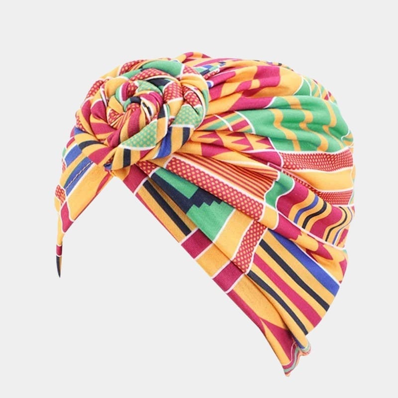 Turban motif africain orange avec nœud